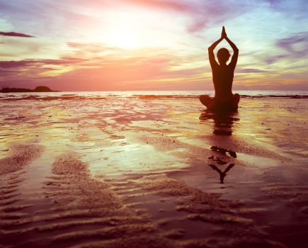 beach_yoga_shutterstock_127609361