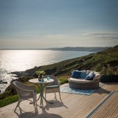 Daydreamer, a luxury beach hut rental at Freathy Cliff, Whitsand Bay, Cornwall, features an outdoor decking area with fantastic sea views. Photo by © Unique Home Stays (uniquehomestays.com, 01637 881183)