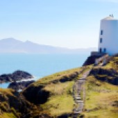 Lighthouse on Ynys Llanddwyn, off Anglesey, in Wales, an island named after the Welsh patron saint of lovers. Photo © Crown copyright (2014) Visit Wales 
