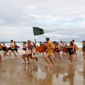 Beach run with the National Trust flag