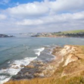 South Devon’s Bigbury-on-Sea is close to us but we only enjoy it in the winter when it’s quiet. It’s a fabulous set-up with steep cliffs, big waves and rolling Devon hills.