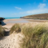 PORTHCOTHAN is a northwest-facing cove backed by grassy dunes that serves as Nampara land Photo: Adam Gibbard/Visit Cornwall