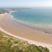 Take in the fresh sea air on the sands of Oxwich Bay