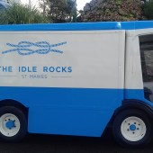 A converted milk float collects the recycling from both hotels
