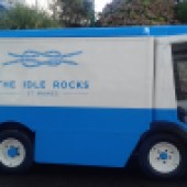 A converted milk float collects the recycling from both hotels