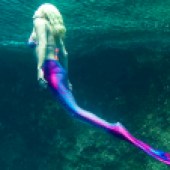 Michelle finds swimming underwater with her mermaid tail on very therapeutic