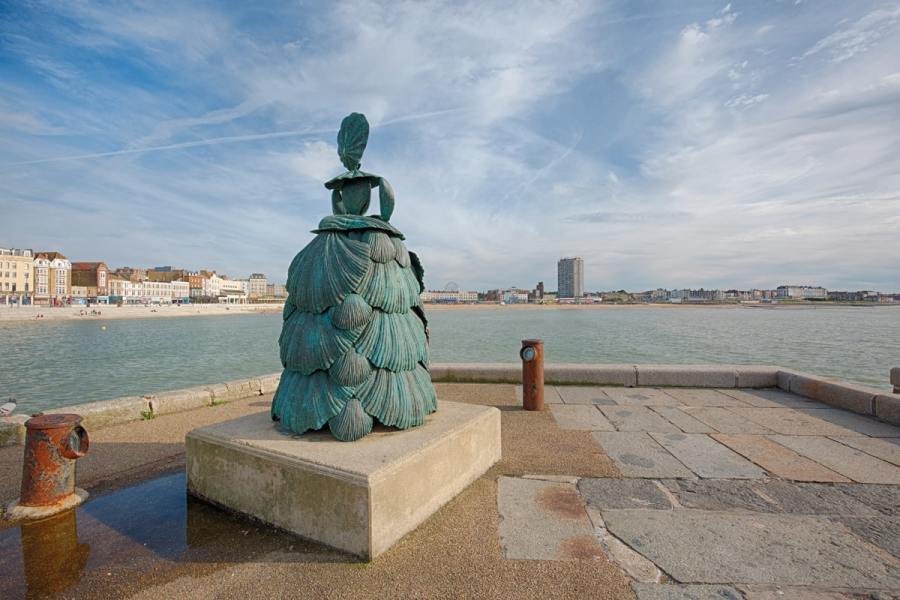 Mrs Booth, Shell Lady - Margate Harbour Arm. Photo credit Thanet District Council