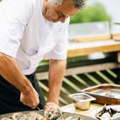 Mark Hix shucking oysters. Photo credit Matt Austin