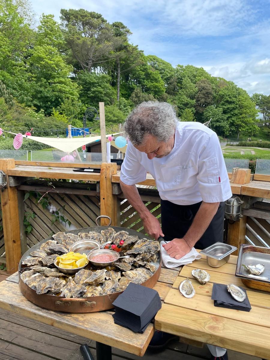 Mark Hix shucking oysters. Photo credit Matt Austin