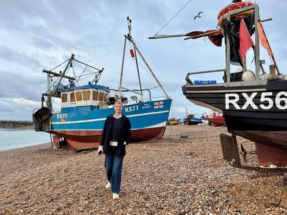 Louise on the shingle beach of the Stade. Photo credit kingandmcgaw.com and louisebody.com