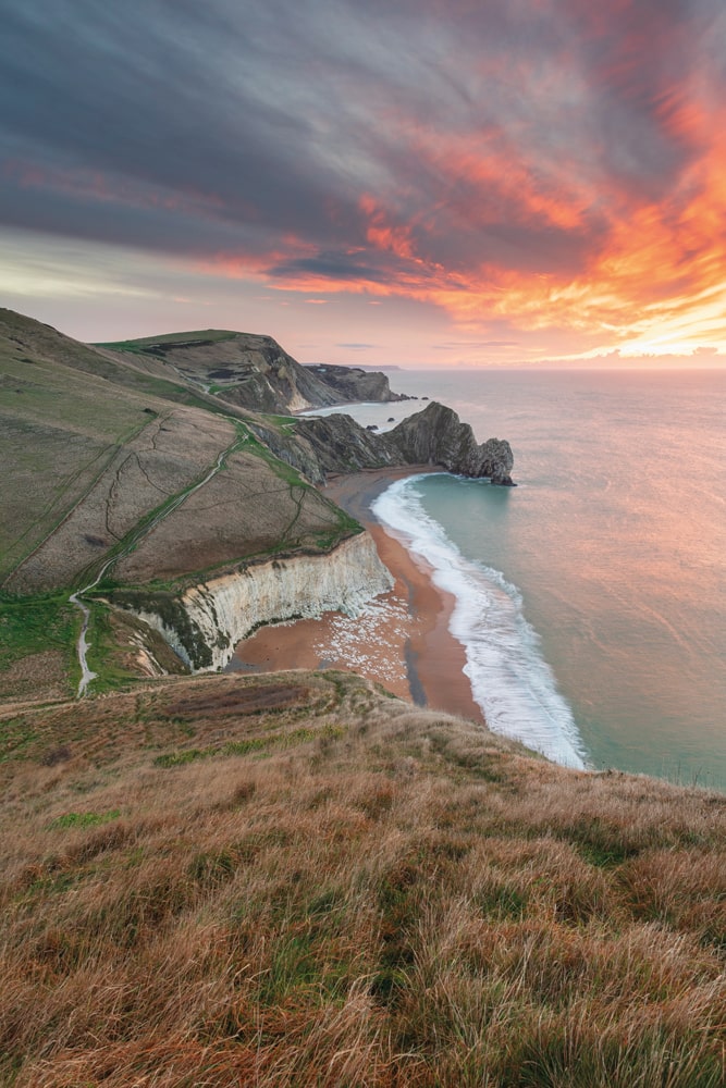 A breathtaking view of Durdle Door – one of Dorset’s most famous Jurassic Coast landmarks – from Swyre Head, the highest point on the Isle of Purbeck - photo credit Daryl Baker
