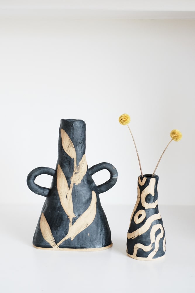 Monochrome vases decorated using the wax resist method
