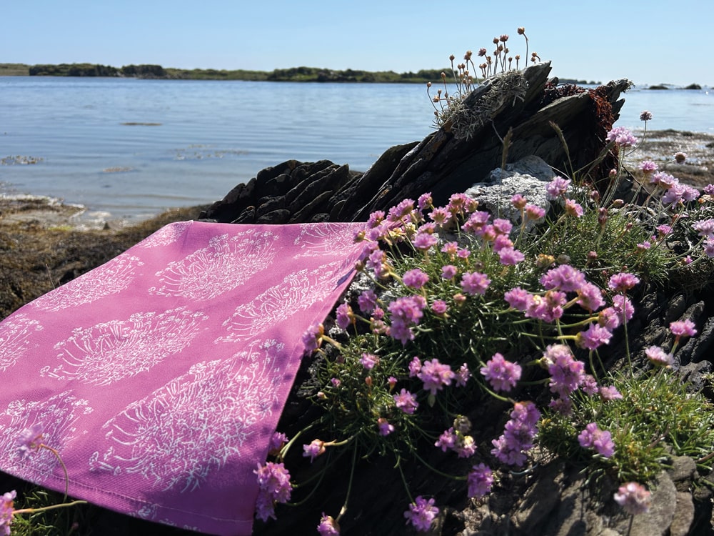 The Sea Pink tea towel is inspired by thrift flowers  