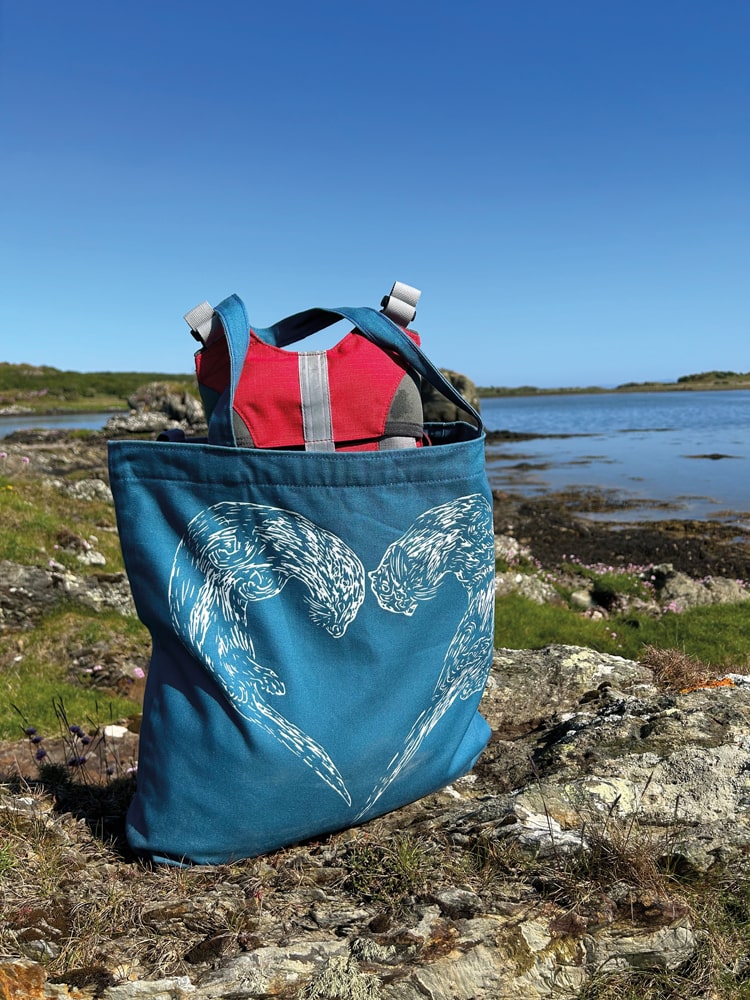 the Swimming Otters tote is the ideal carry-all for beach days