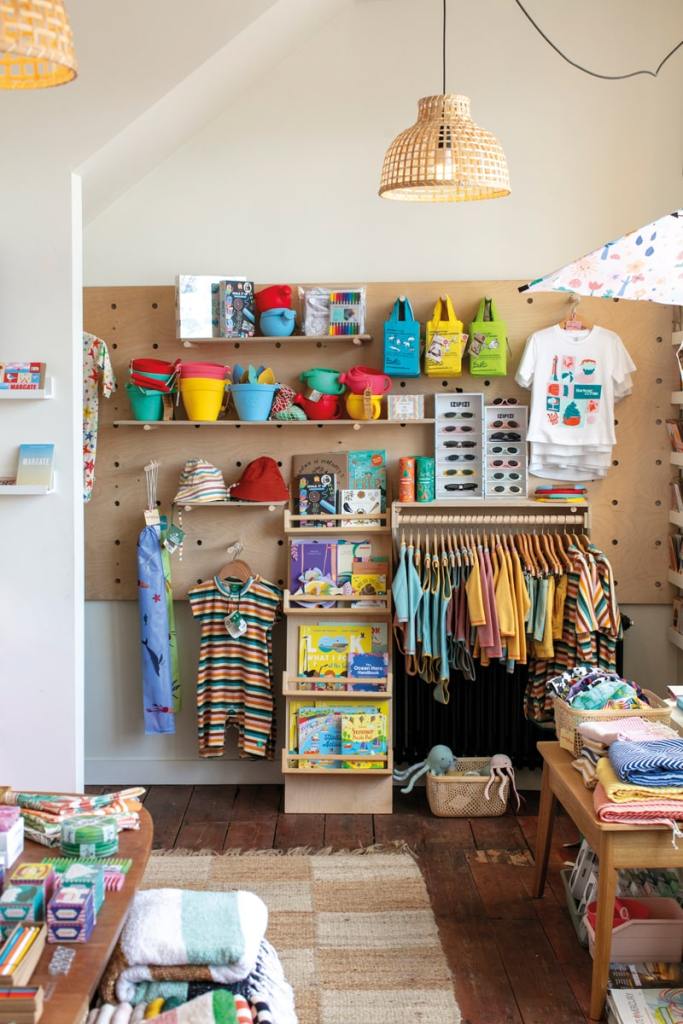 Cheerful, colourful – and practical: the summer collection includes beachwear, activity books and stylish, eco-friendly buckets and spades for holiday fun, along with marine-themed toys and wall art to remind you of the coast long after you head home