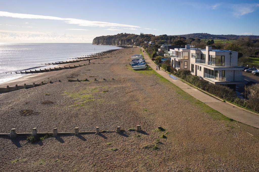 A view along the beach to the cliffs beyond
