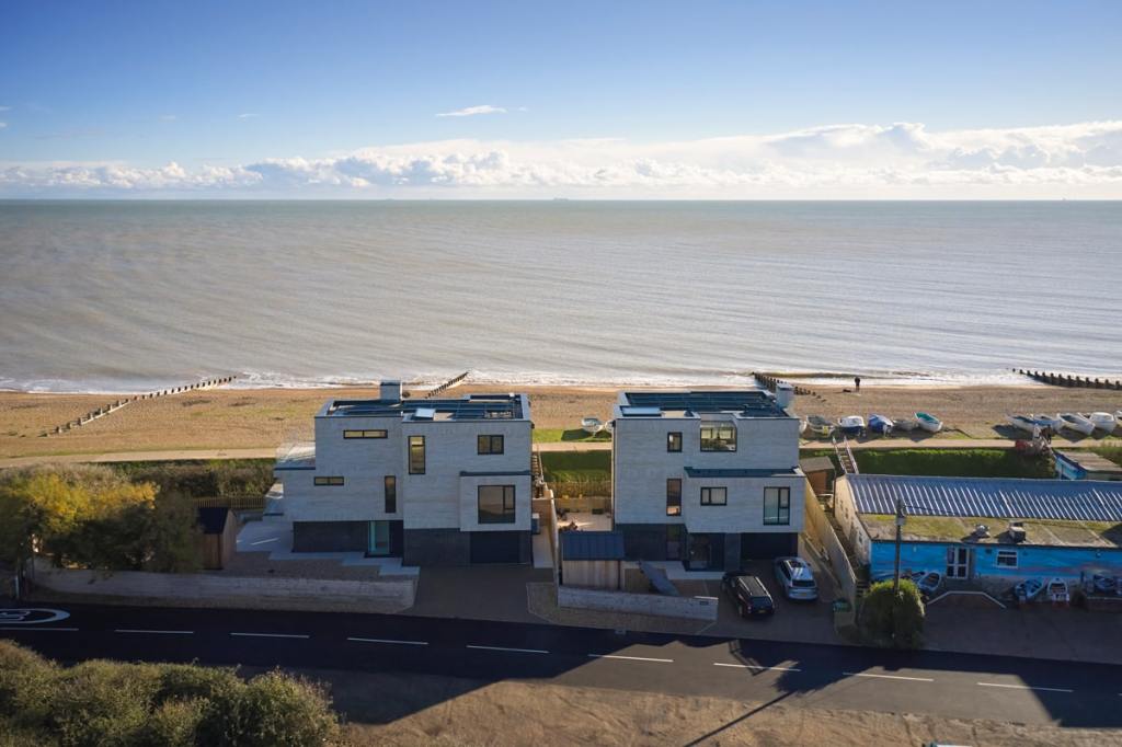 The two houses are not identical – each has its own design details responding to the buyer’s needs