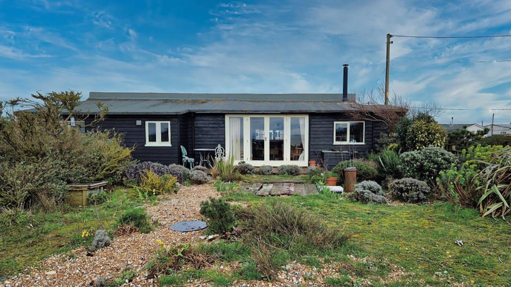 Dungeness, Kent - Guide price £545,000. Phillips and Stubbs