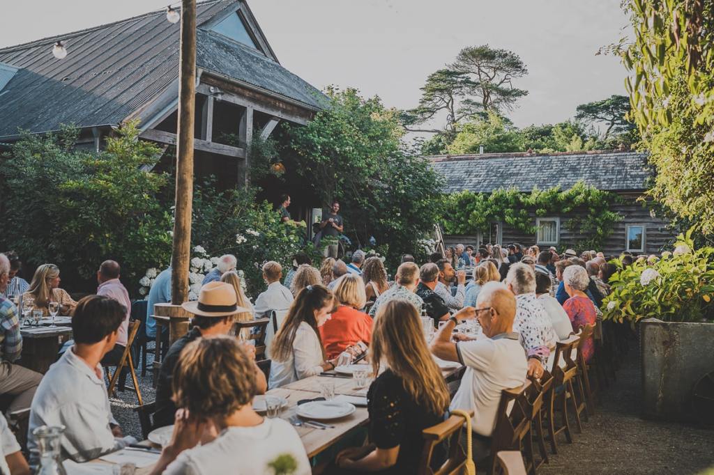 A farm supper at sunset