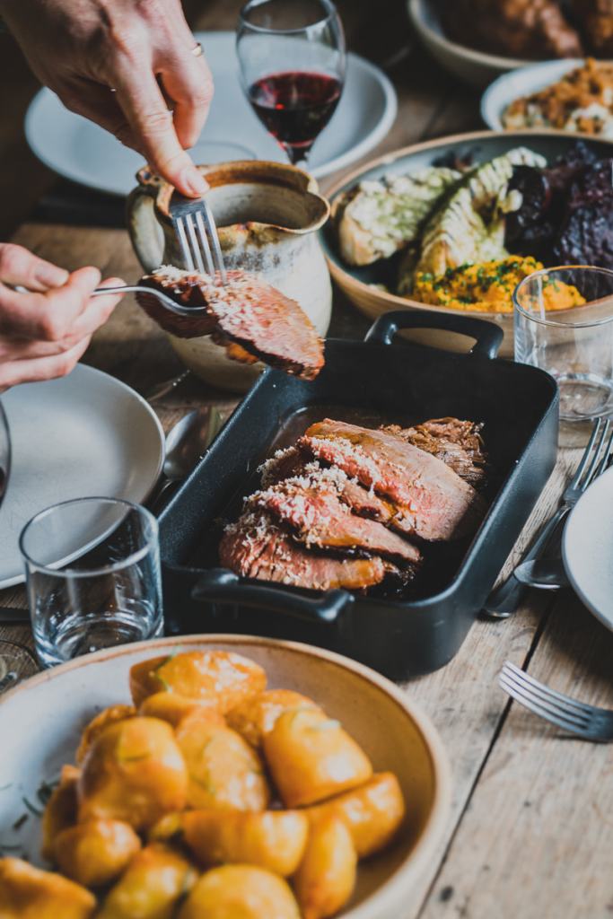 Guests tuck into a Sunday roast at the farm