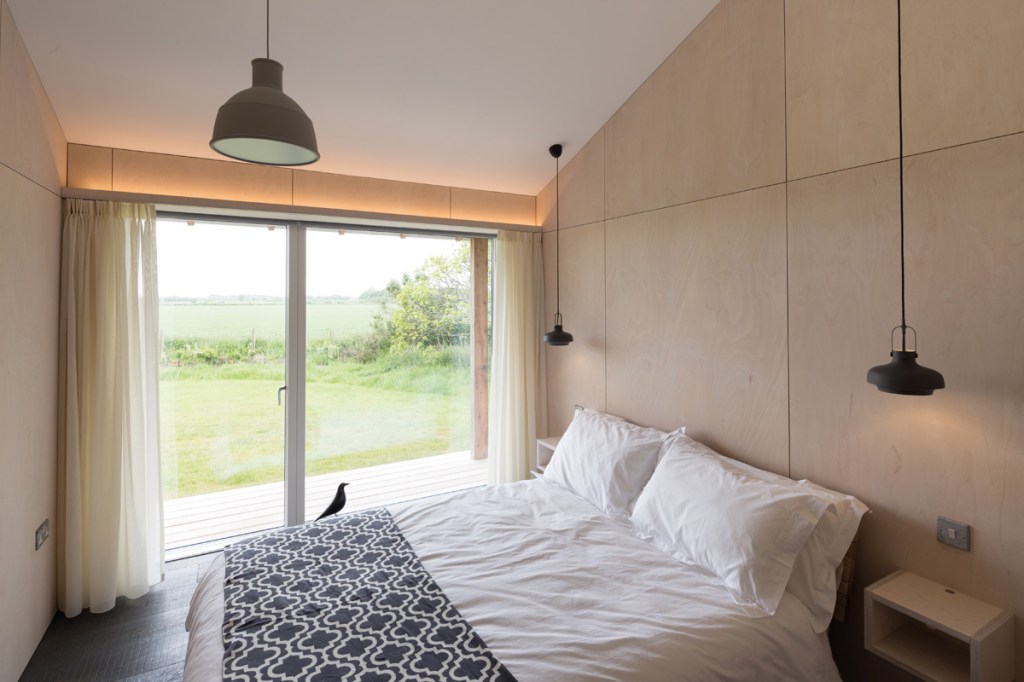 This bedroom enjoys views of the surrounding countryside