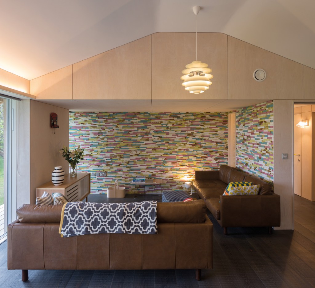 Feature walls add colour to the calming natural wood interior