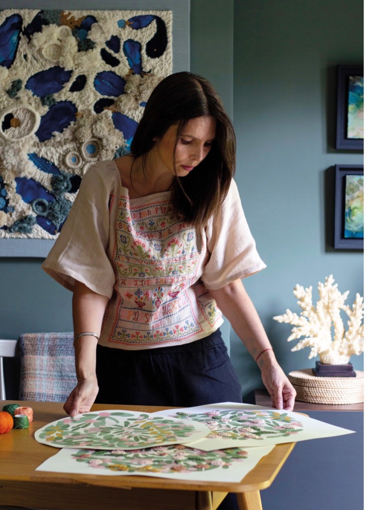 Helen first applies a design to fabric or paper as a guide, then embroiders layers of texture and colour
