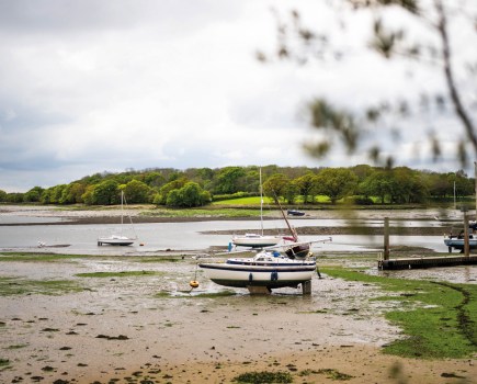 The tranquil harbour at low tide. Photography Matt Austin