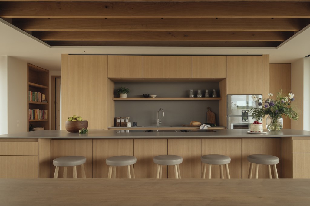 Natural materials, including engineered oak flooring, sawn timber boards for the walls, clay plaster and natural stone are used inside and outside the property