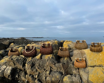 A selection of Claire’s ponier à cou baskets, pictured at Rousse Headland, Guernsey – crafted in different sizes, they show the beautiful variation in the natural colours of the willow
