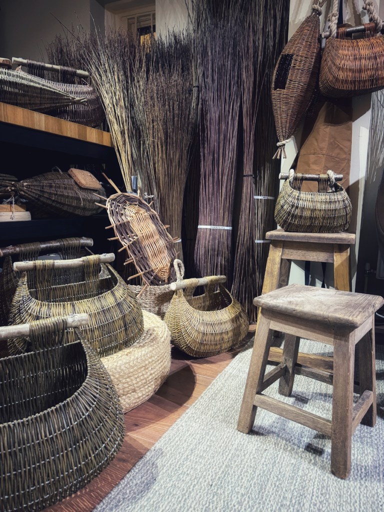 Finished baskets and willow rods in Claire’s workshop