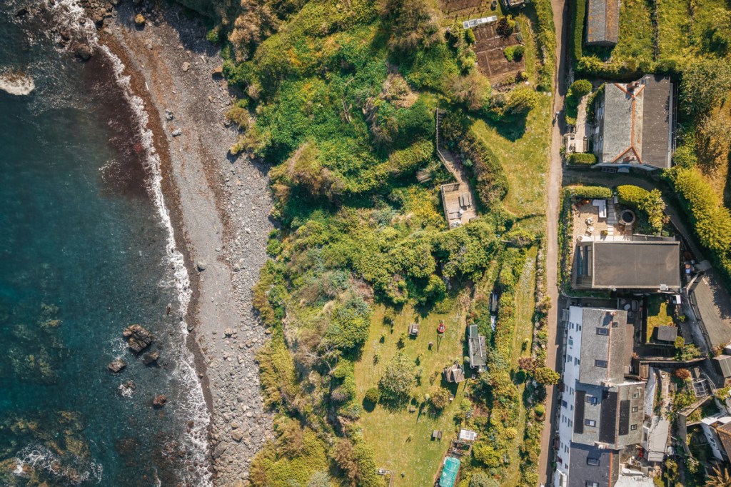 An aerial shot of Ukiyo (top centre of photo) and the rugged shore below