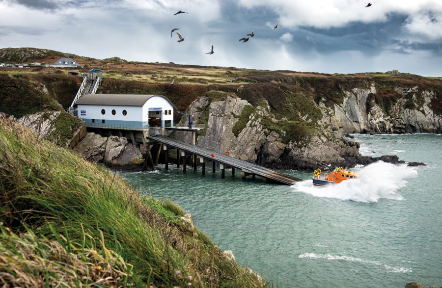 St Davids Tamar class lifeboat Norah Wortley 16-26 being launched down the slipway for a training exercise. Splash and White Spray as the lifeboat hits the water.